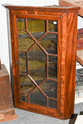 Lot 1383 - A Georgian inlaid mahogany glazed corner cupboard, 80cm by 50cm by 115cm
