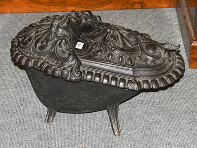 Lot 1390 - A cast iron coal box, 60cm by 40cm by 35cm