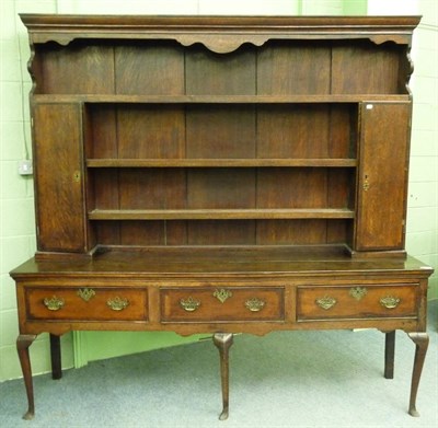 Lot 1588 - A George III Oak and Mahogany Crossbanded High Dresser, probably Staffordshire/Shropshire, late...