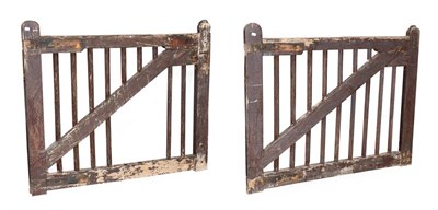 Lot 1146 - Robert Mouseman Thompson (1876-1955): A Pair of English Oak Gates, each with carved mouse...