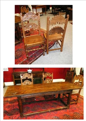 Lot 1590 - An Oak Dining Table, of three plank construction above a chamfered frieze, four barrel legs and...