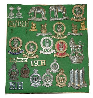 Lot 40 - A Quantity of Militaria, including four small display boards of cap and collar badges and...
