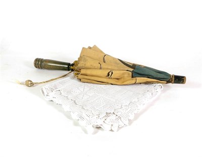 Lot 45 - A Second World War Child's Advertising Umbrella, the white cotton canopy printed with a boy...