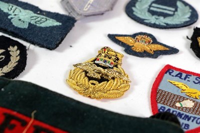 Lot 53 - A Quantity of Post-Second World War RAF Insignia, including mohair cap bands, raised bullion thread