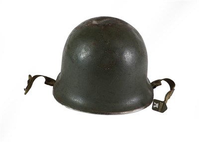 Lot 75 - A Second World War British Mark III Steel ''Turtle'' Combat Helmet, with original dark green...