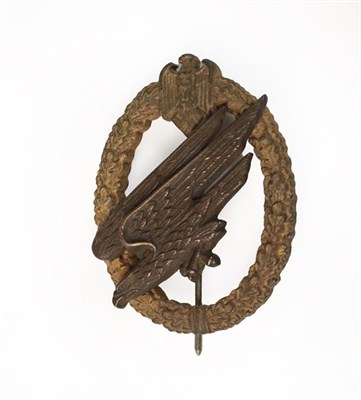 Lot 83 - A German Third Reich Army Paratrooper's Badge, the eagle with traces of silvering, the reverse with