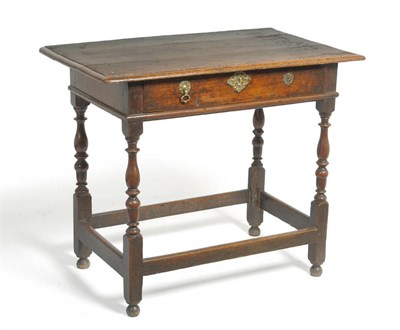 Lot 1599 - An Oak Side Table, circa 1700, the rectangular top above a single frieze drawer, raised on...