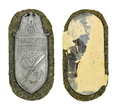 Lot 101 - A German Third Reich Narvik Shield, Silver Class, Heer, with grey wool backing, the reverse...