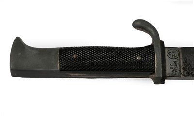 Lot 110 - A German Third Reich Hitler Youth Knife, the 14cm single edge broad steel blade marked with RZM log