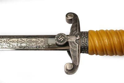 Lot 113 - A German Third Reich Heer Staff Officer's Presentation Dagger, the 25cm double edge steel blade...