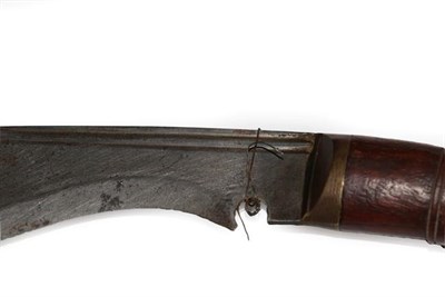 Lot 118 - An Early 20th Century Nepalese Kukri, the 38cm steel blade with Brahmic type script to the back...