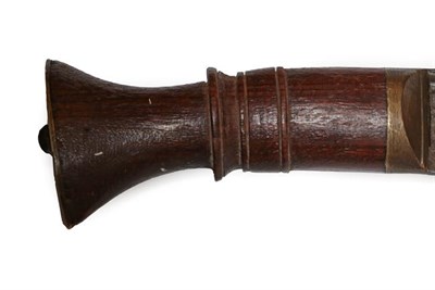 Lot 118 - An Early 20th Century Nepalese Kukri, the 38cm steel blade with Brahmic type script to the back...