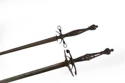 Lot 136 - A Georgian Mourning Sword, the 76cm triangular section fullered steel blade bearing traces of...