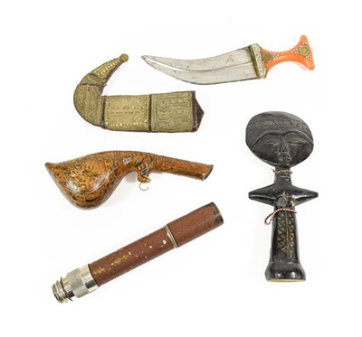 Lot 150 - An Arab Jambiya, the curved steel blade with raised medial ridge, waisted amber type grip and...