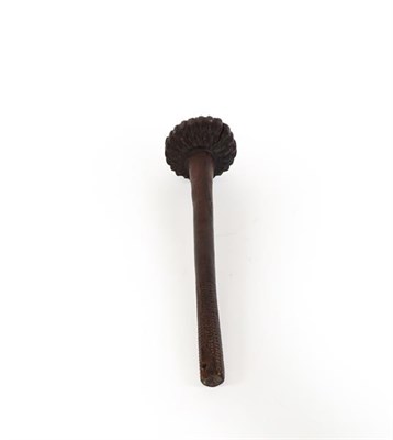 Lot 151 - A 19th Century Fijian Ula (Throwing Club), the large compressed globular head deeply carved...