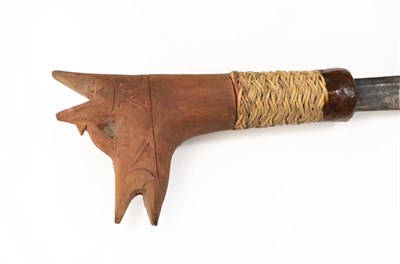 Lot 153 - A Borneo Sumpitan, with steel blade bound to the wood haft with wicker, together with a bamboo...