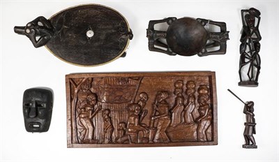 Lot 159 - A Borneo Zoomorphic Centrepiece Platter, carved as a stylised beast with inset shell eyes, flat...