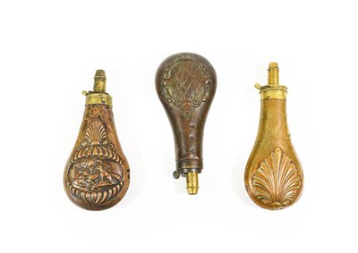 Lot 173 - Three 19th Century Copper Powder Flasks:- one by Sykes, each side embossed with a flute...