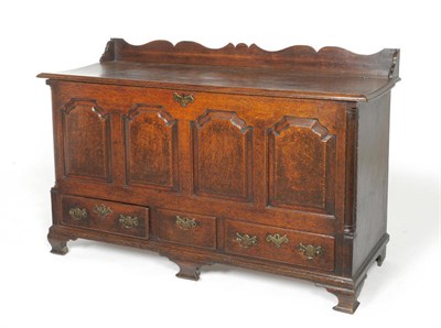 Lot 1611 - A George III Oak Mule Chest, probably Lancashire, 3rd quarter 18th century, the three-quarter...