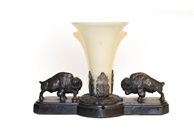 Lot 3 - A parcel gilt bronze oval frame, 25cm high, another frame and a spelter light fitting, 29cm long