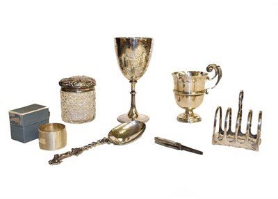Lot 5 - A selection of silver including an Irish christening mug, cased egg cup and spoon, toast rack,...