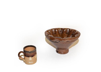 Lot 25 - A quantity of brown and salt glazed stoneware including a spirit barrel sprigged with the Royal...