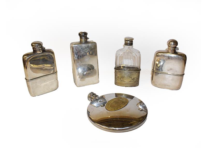 Lot 44 - Five silver plated spirit flasks, one incorporating a cigarette case (one tray)