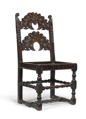 Lot 1616 - A 17th Century Joined Oak Yorkshire Chair, the double crescent  carved back support with...