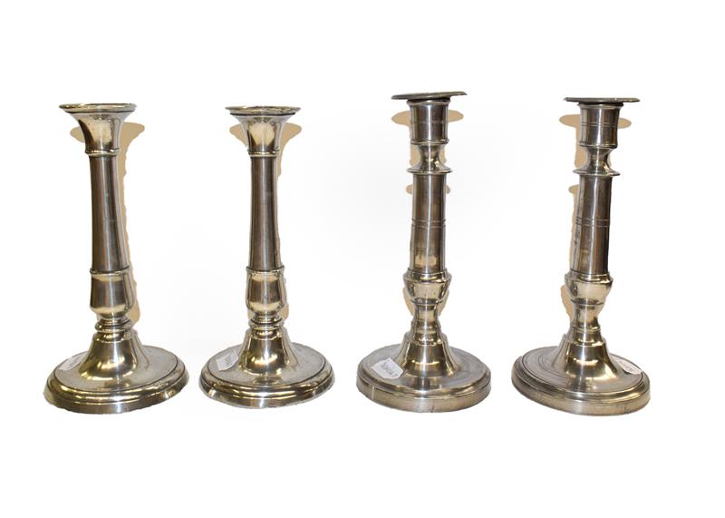 Lot 65 - A pair of 19th century pewter ejector candlesticks of cannon barrel form, together with another...