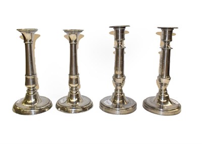 Lot 65 - A pair of 19th century pewter ejector candlesticks of cannon barrel form, together with another...