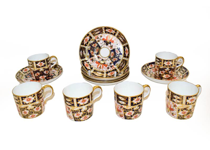 Lot 68 - A set of six Royal Crown Derby coffee cups and saucers in Imari 2451 pattern, date code 1930