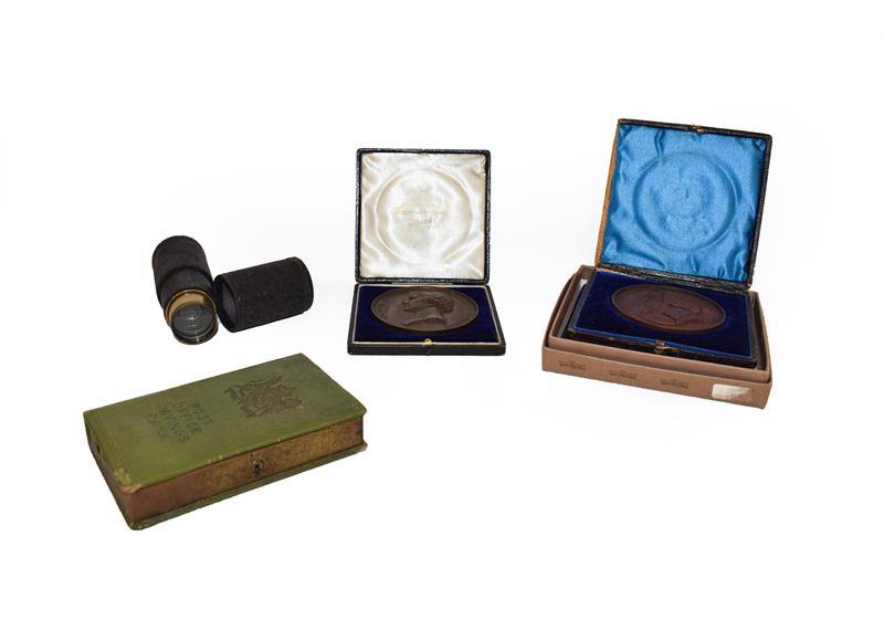 Lot 74 - A tray of assorted collectables including a live steam tank engine, two cased bronze medical medals