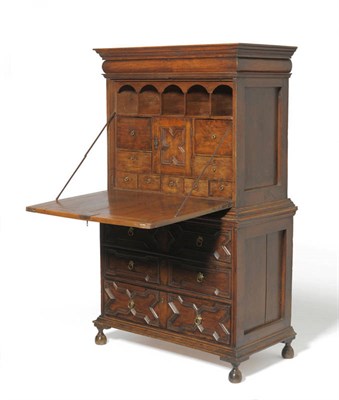 Lot 1619 - A 17th Century Style Secretaire a Abattant, the bold cornice above cushion shaped frieze, the...