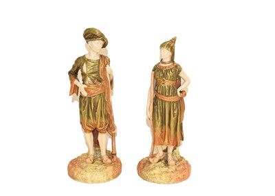 Lot 101 - A pair of Royal Worcester figures modelled as Bringaree Indians, date code 1887, 23cm high
