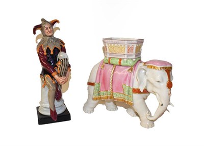 Lot 103 - Royal Worcester elephant model together with a Royal Doulton figure 'The Jester' - HN2016, 25cm (2)