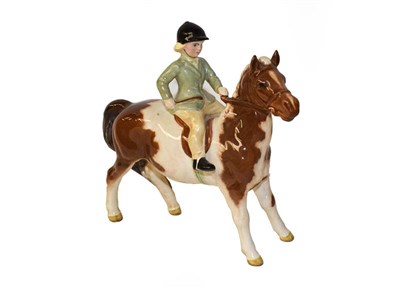 Lot 105 - Beswick Girl on Pony, model No. 1499, skewbald gloss