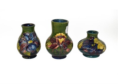 Lot 110 - Five Walter Moorcroft items including an Anemone jar and cover, three vases and a tazza (Pewter...