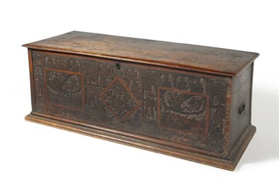 Lot 1625 - An Italian Cypresswood Cassone, with pen decorated hinged lid depicting figures, with chip...