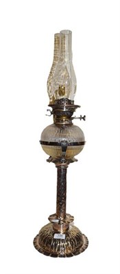 Lot 139 - An Arts & Crafts silver plated oil lamp by Hukin & Heath, 52cm excluding the chimney