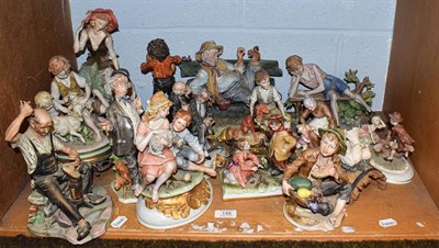 Lot 148 - A quantity of Capodimonte coloured bisque and composite figures including signed examples,...