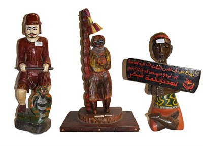 Lot 156 - A Nigerian carved wooden figure with five various others (6)