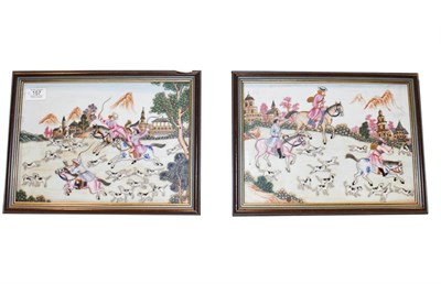 Lot 157 - A pair of framed Continental porcelain tiles painted in coloured enamels with hunting scenes,...