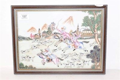 Lot 157 - A pair of framed Continental porcelain tiles painted in coloured enamels with hunting scenes,...