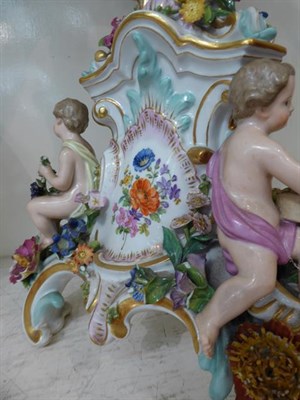 Lot 161 - A Meissen porcelain seven light figural candelabrum, late 19th century, with flower encrusted...