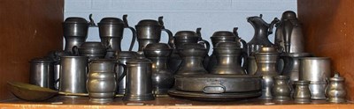 Lot 163 - A large quantity of 18th century and later pewter items including flagons, tankards and serving...