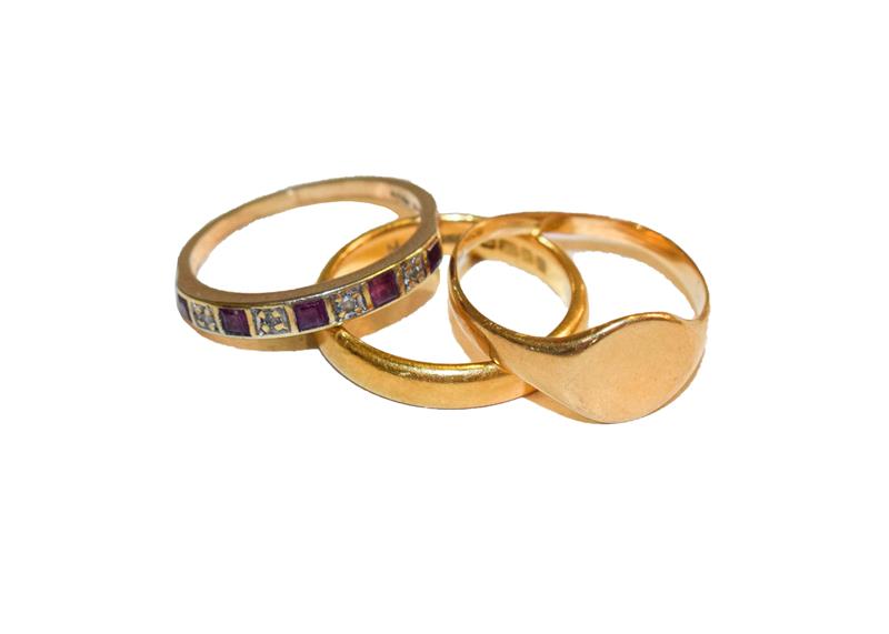 Lot 166 - A 22 carat gold band ring, finger size M1/2, an 18 carat gold signet ring, out of shape, and a...
