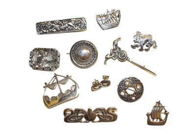 Lot 167 - Ten silver brooches of varying designs, and a pair of earrings stamped 'SILVER'