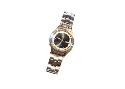 Lot 170 - An automatic day/date centre seconds wristwatch, signed Seiko 5, circa late 1970s