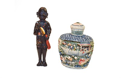 Lot 196 - A Chinese coloured ivory snuff bottle circa 1920's and a Japanese figural wood netsuke (2)