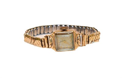 Lot 203 - A lady's 9 carat gold wristwatch, later plated flexible bracelet